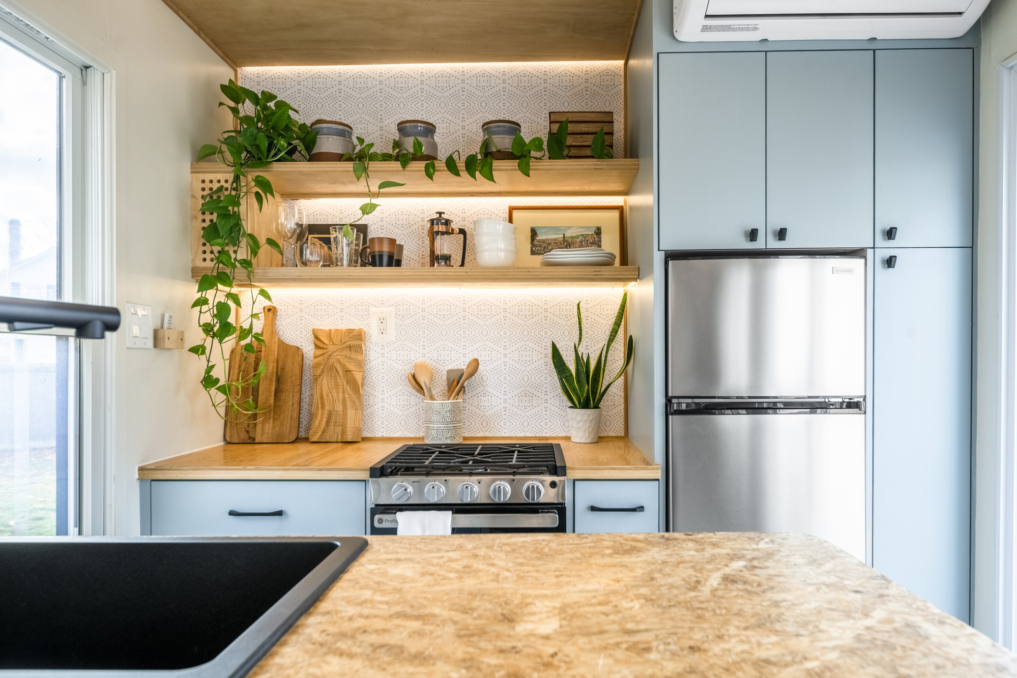Interior wide with loft and kitchen